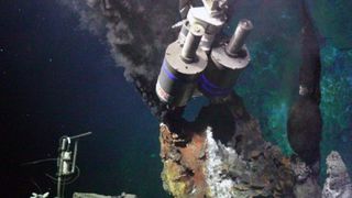 a remote operated vehicle approaches a large hydrothermal vent