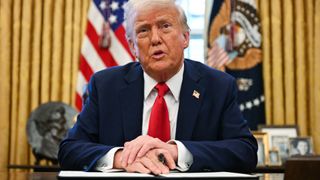 US President Donald Trump speaks to the press as he signs an executive order to create a US sovereign wealth fund, in the Oval Office of the White House on February 3, 2025, in Washington, DC.