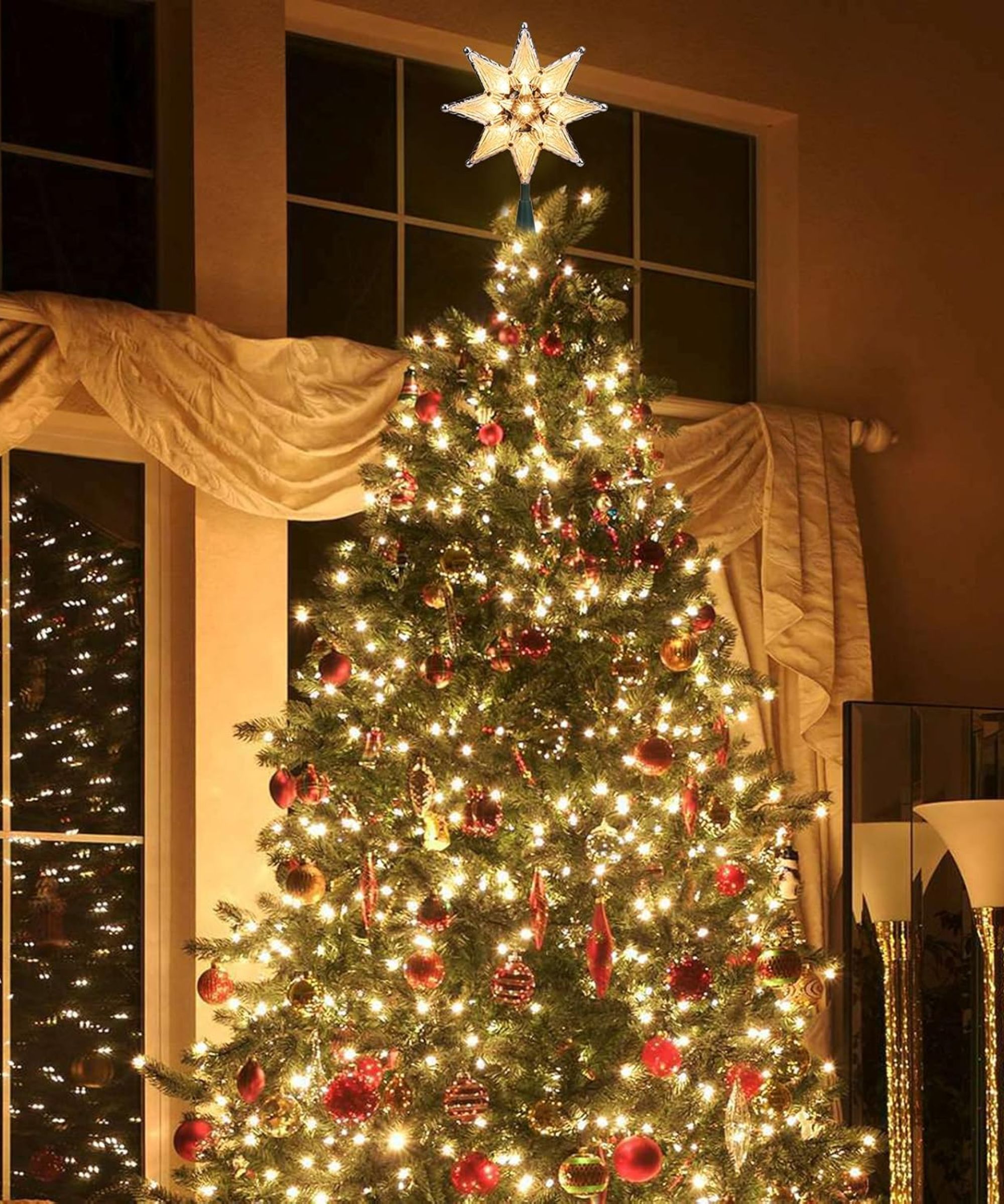 Christmas tree with red ornaments and light-up star