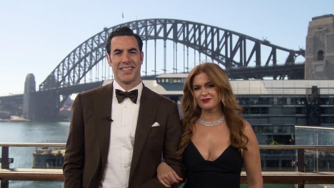 Sacha Baron Cohen and Isla Fisher during the Oscars