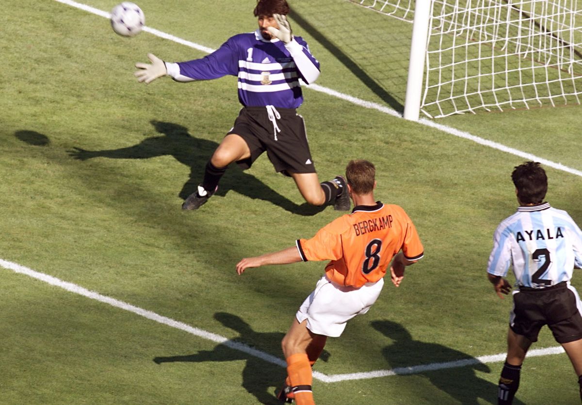 Dennis Bergkamp scores the winning goal for the Netherlands against Argentina in the quarter-final of the 1998 World Cup in France