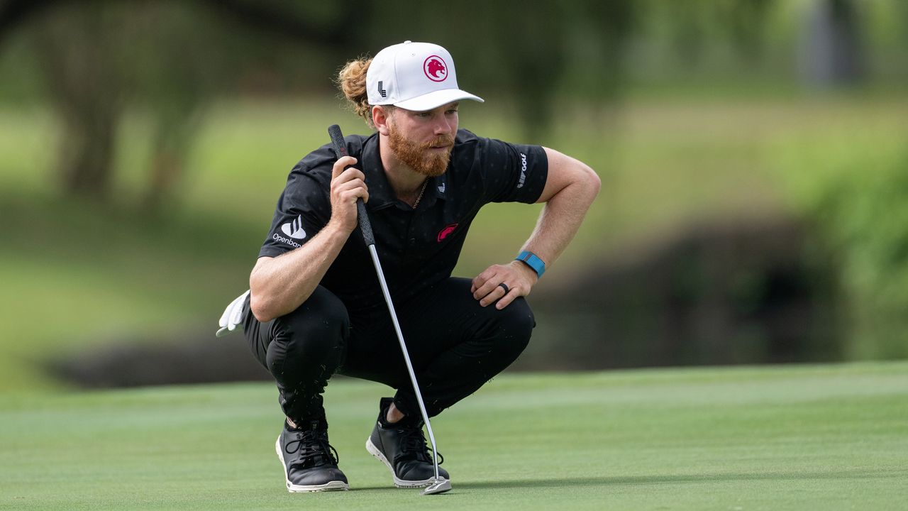 Kieran Vincent lines up a putt