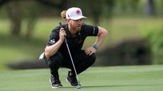 Kieran Vincent lines up a putt