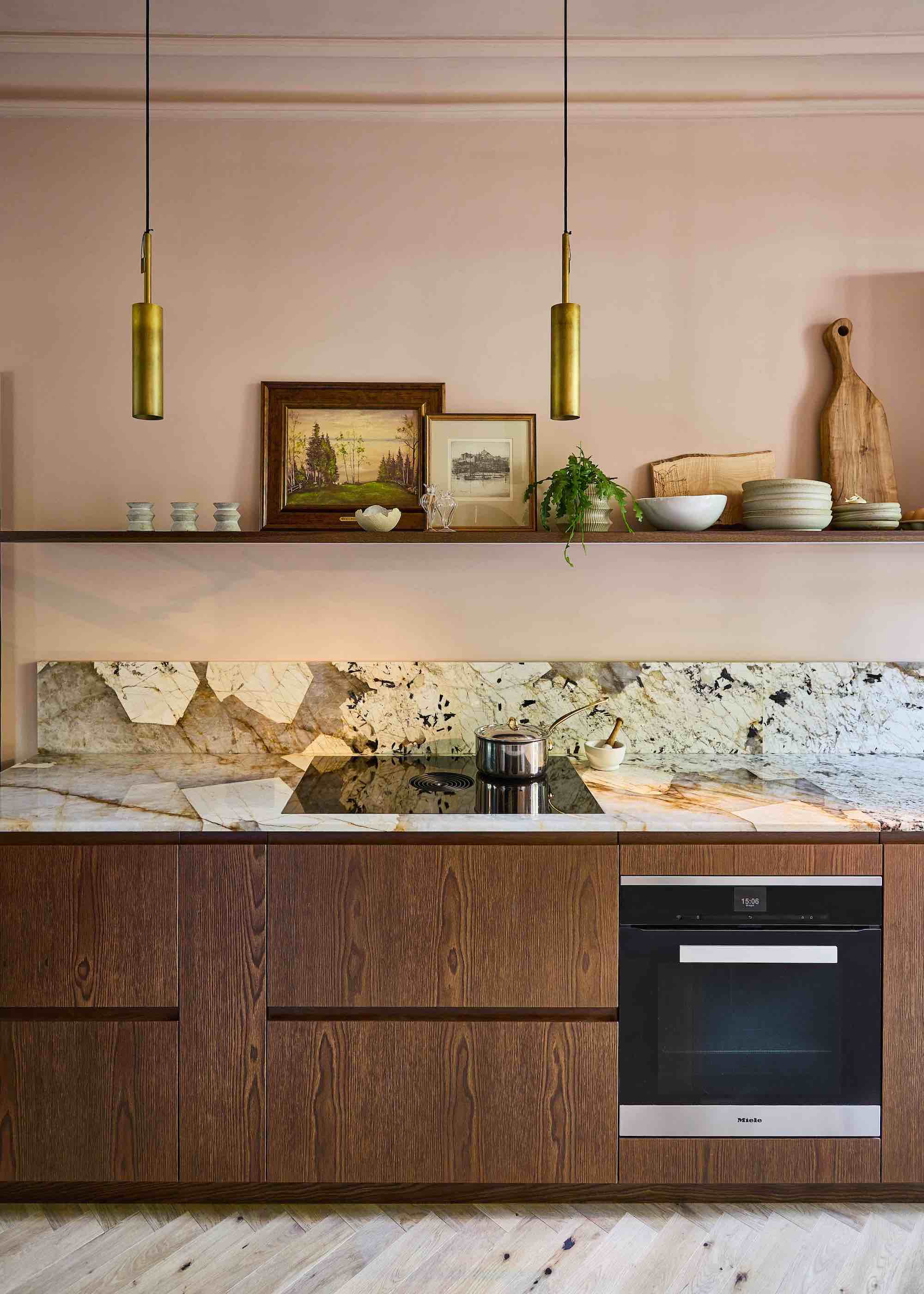 wood kitchen with marble worktops