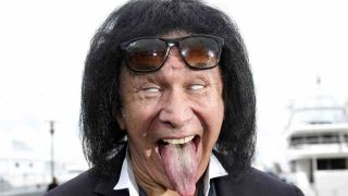 A make-up free Gene Simmons sticking out his tongue