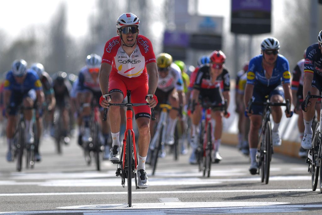 WAREGEM BELGIUM MARCH 31 Arrival Christophe Laporte of France and Team Cofidis during the 75th Dwars Door Vlaanderen 2021 Mens Elite a 1841km race from Roeselare to Waregem DDV DDV21 FlandersClassic A travers la Flandre on March 31 2021 in Waregem Belgium Photo by Luc ClaessenGetty Images