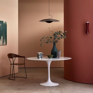 Dining room with two-tone earthy, red walls