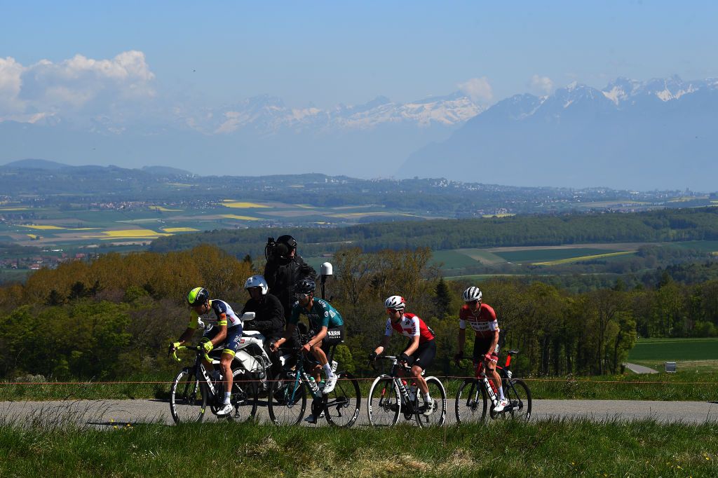 OULENSSOUSECHALLENS SWITZERLAND APRIL 28 LR Baptiste Planckaert of Belgium and Team Intermarch Wanty Gobert Matriaux Diego Lpez Fuentes of Spain and Equipo Kern Pharma Nils Brun of Switzerland and Team Switzerland and Toms Skujins of Latvia and Team Trek Segafredo compete in the breakaway during the 75th Tour De Romandie 2022 Stage 2 a 1682km stage from challens to challens TDR2022 on April 28 2022 in OulenssousEchallens Switzerland Photo by Dario BelingheriGetty Images
