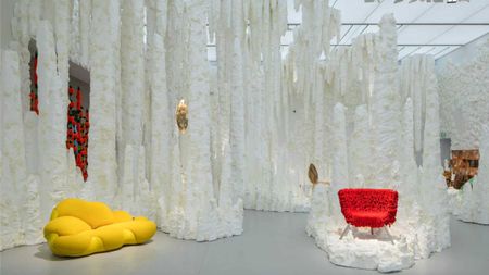 Estúdio Campana exhibition designed like a white cave with colourful furniture 