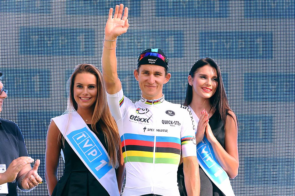 World champion Michal Kwiatkowski (Etixx-QuickStep) waves to fans at his home race