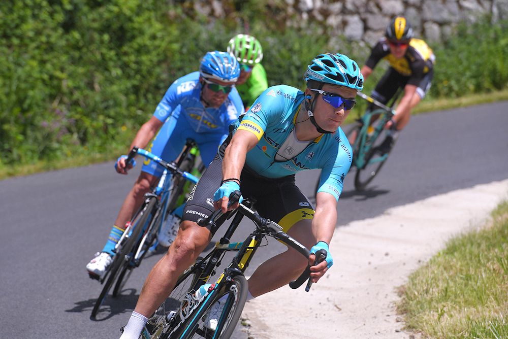 Astana&rsquo;s Alexey Lutsenko leads the breakaway