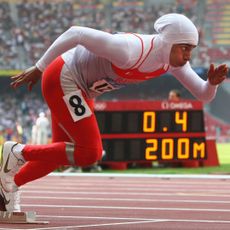 BEIJING - AUGUST 19: Roqaya Al-Gassra of Bahrain competes in the Women's 200m Heats held at the National Stadium on Day 11 of the Beijing 2008 Olympic Games on August 19, 2008 in Beijing, China. (Photo by Alexander Hassenstein/Bongarts/Getty Images)