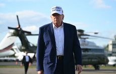 US President Donald Trump boards Air Force One from Morristown Municipal Airport
