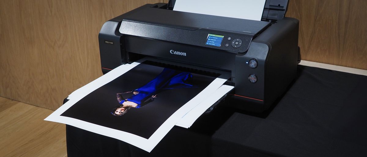 Canon ImagePrograf Pro-1100 printer in a wooden-interior studio, printing photographs