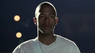 Devon Miles (Nick Cannon) drumming away during tryouts in Drumline