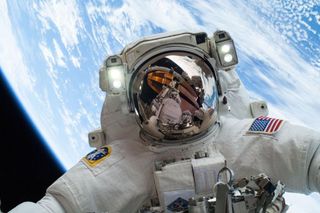 NASA astronaut Mike Hopkins on a spacewalk in 2013.