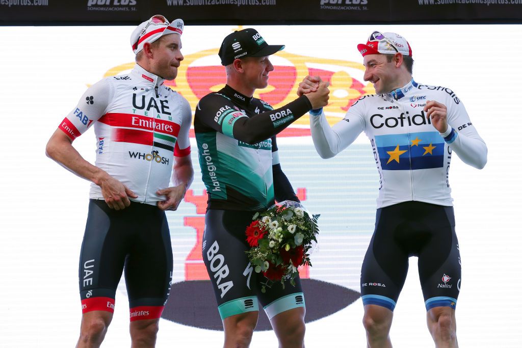 ROQUETAS DE MAR SPAIN FEBRUARY 16 Podium Alexander Kristoff of Norway and UAE Team Emirates Pascal Ackermann of Germany and Team Bora Hansgrohe Elia Viviani of Italy and Team Cofidis Solutions Credits Celebration during the 33rd Clsica de Almera 2020 a 1876km stage from Roquetas de Mar to Roquetas de Mar ClasicaAlmeria on February 16 2020 in Roquetas de Mar Spain Photo by Gonzalo Arroyo MorenoGetty Images