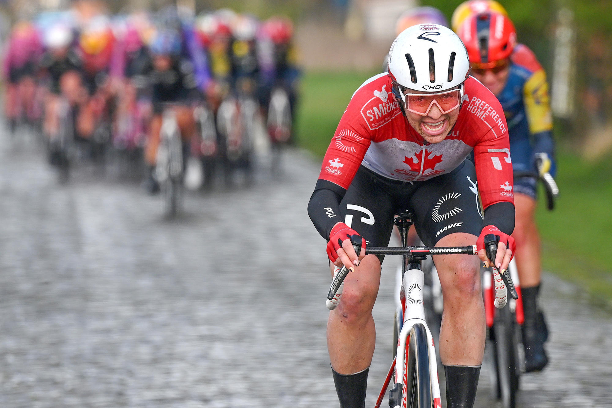 Canadian champion Alison Jackson (St Michel-Preference Home-Auber93) grimaces as she attacks on a cobbled sector at the 2026 Ronde van Brugge