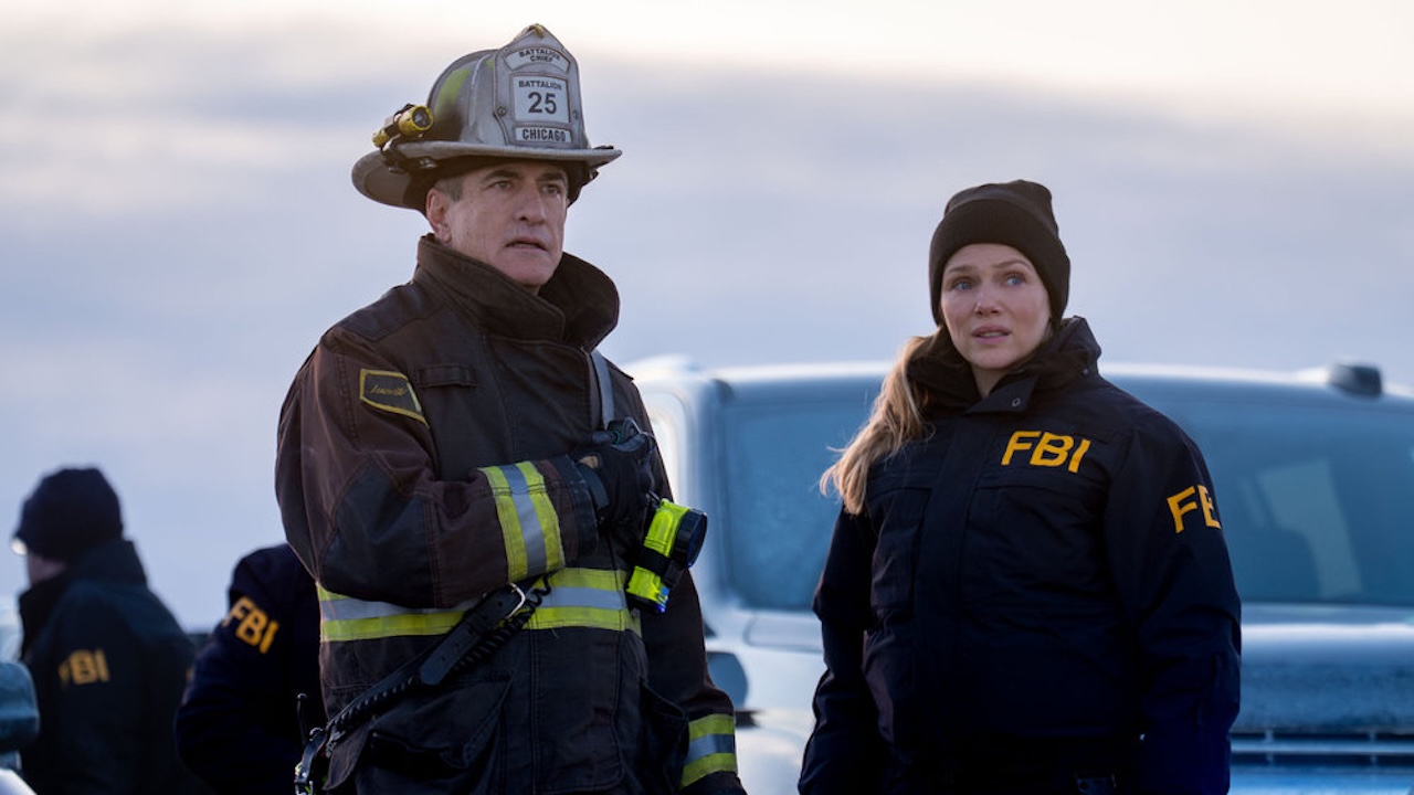 Pascal chatting with Upton at the airfield in One Chicago 2026 crossover