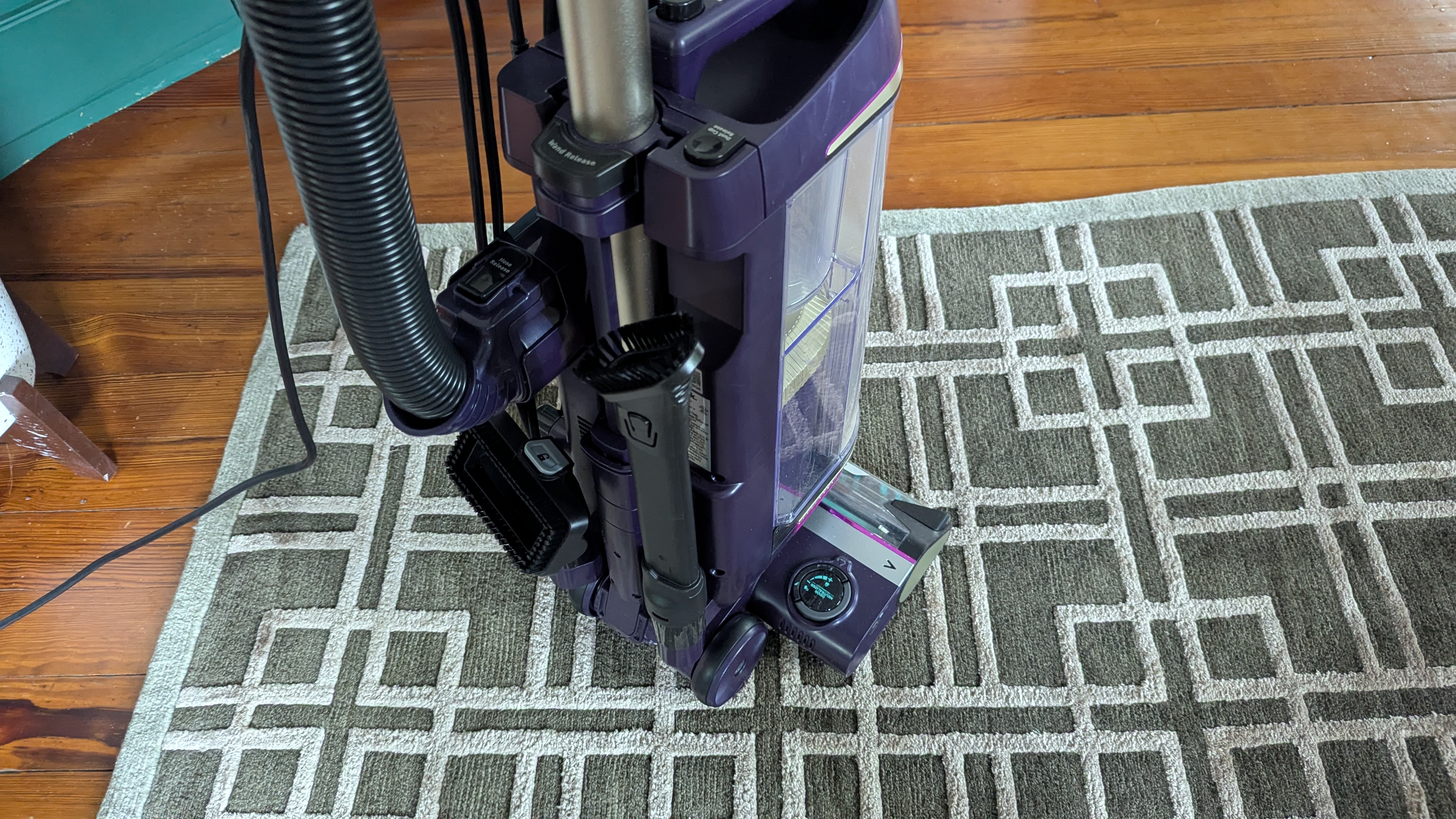 Close up of detail tools housed on back of Shark PowerDetect Upright vacuum