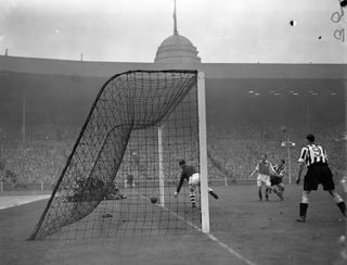 Robledo, centre, scores the winner for Newcastle (PA)