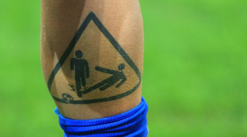 Which footballers have tattoos of their former clubs?