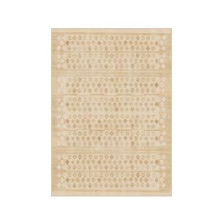 A rectangular light brown rug with geometric patterns on top of it