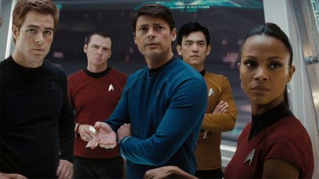The cast of Star Trek (2009): Chris Pine as Captain Kirk, Simon Pegg as Scotty, Karl Urban as Bones, John Cho as Sulu, and Zoe Salda&ntilde;a as Uhura.