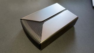 A photo of a Seagate FireCuda X Vault external hdd, resting on a computer desk