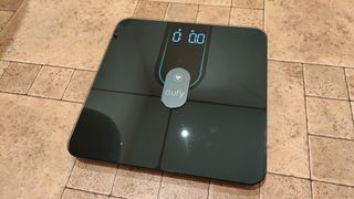 Eufy Smart Scale P2 Pro on bathroom floor