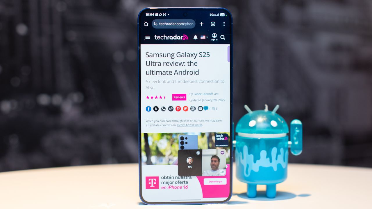 Samsung Galaxy S25 Plus in Navy Blue showing TechRadar.com with Galaxy S25 Ultra review