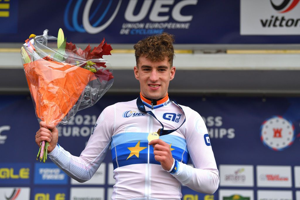COL DU VAM DRENTHE NETHERLANDS NOVEMBER 06 Gold medalist Ryan Kamp of Netherlands celebrates winning during the medal ceremony after the 19th UEC European Cyclocross Championships 2021 Mens U23 EuroCross21 UECcycling on November 06 2021 in Col du Vam Drenthe Netherlands Photo by Luc ClaessenGetty Images