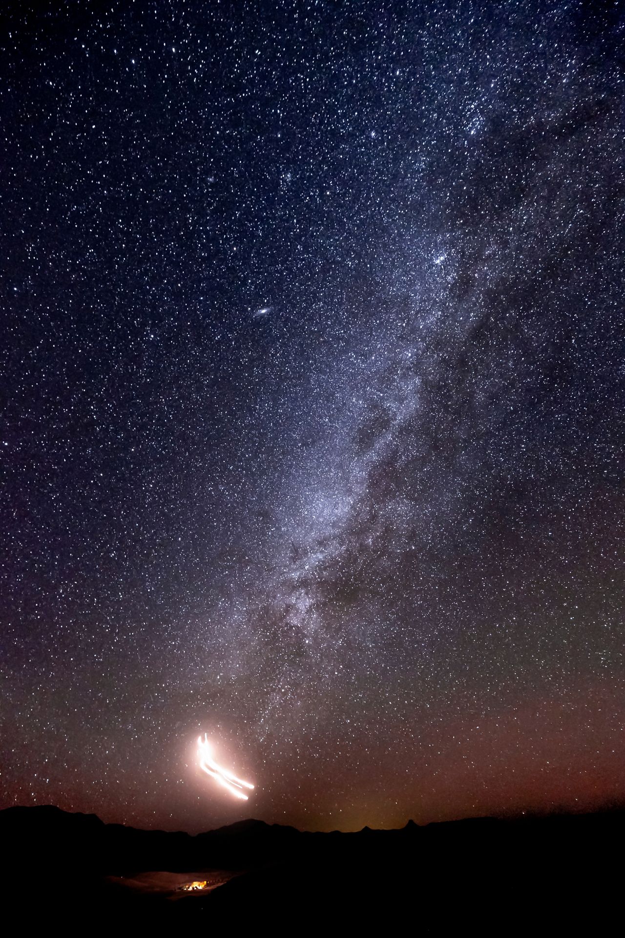 The Red Bull Air Force skydiving team paint the night sky in dazzling "Marfa lights" near Marfa, Texas in these amazing images by photographer Dustin Snipes to celebrate the night sky for the winter solstice 2020. The jump took place in November 2020.