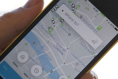 The Uber app and a map of London