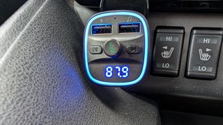lencent fm transmitter inside a nissan leaf cockpit