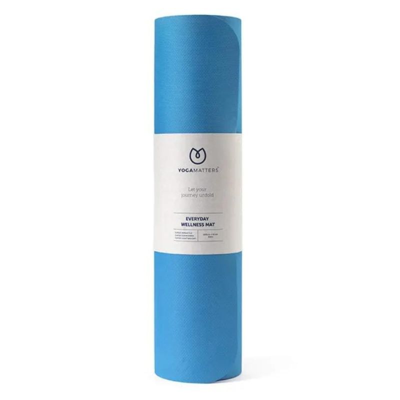 A rolled-up blue thick yoga mat.
