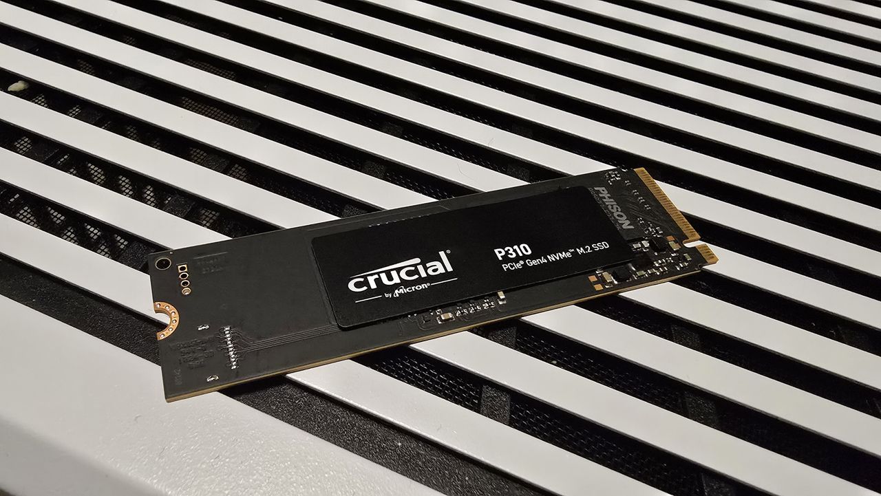 A Crucial P310 SSD installed inside a gaming PC.