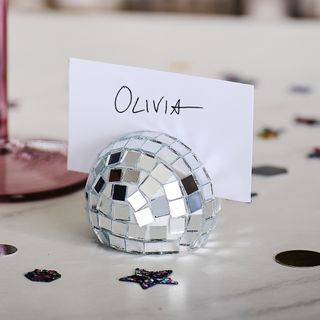 Disco ball place card holder holding name