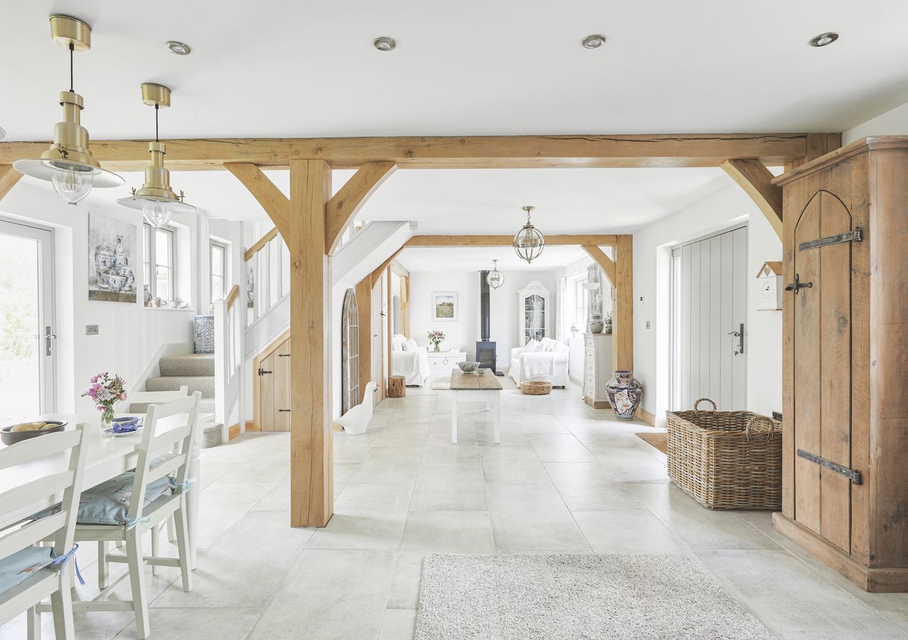 open plan living kitchen sand dining area in oak frame home