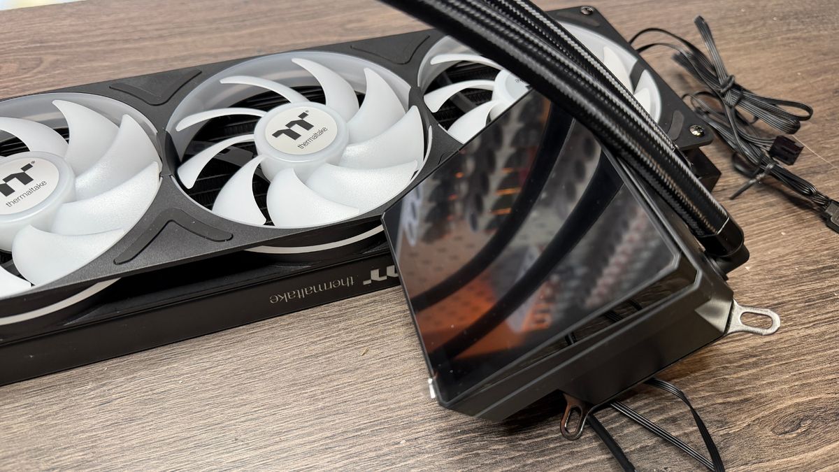 Thermaltake TH360 V3 Ultra ARGB Sync outside of a PC case with fans installed.