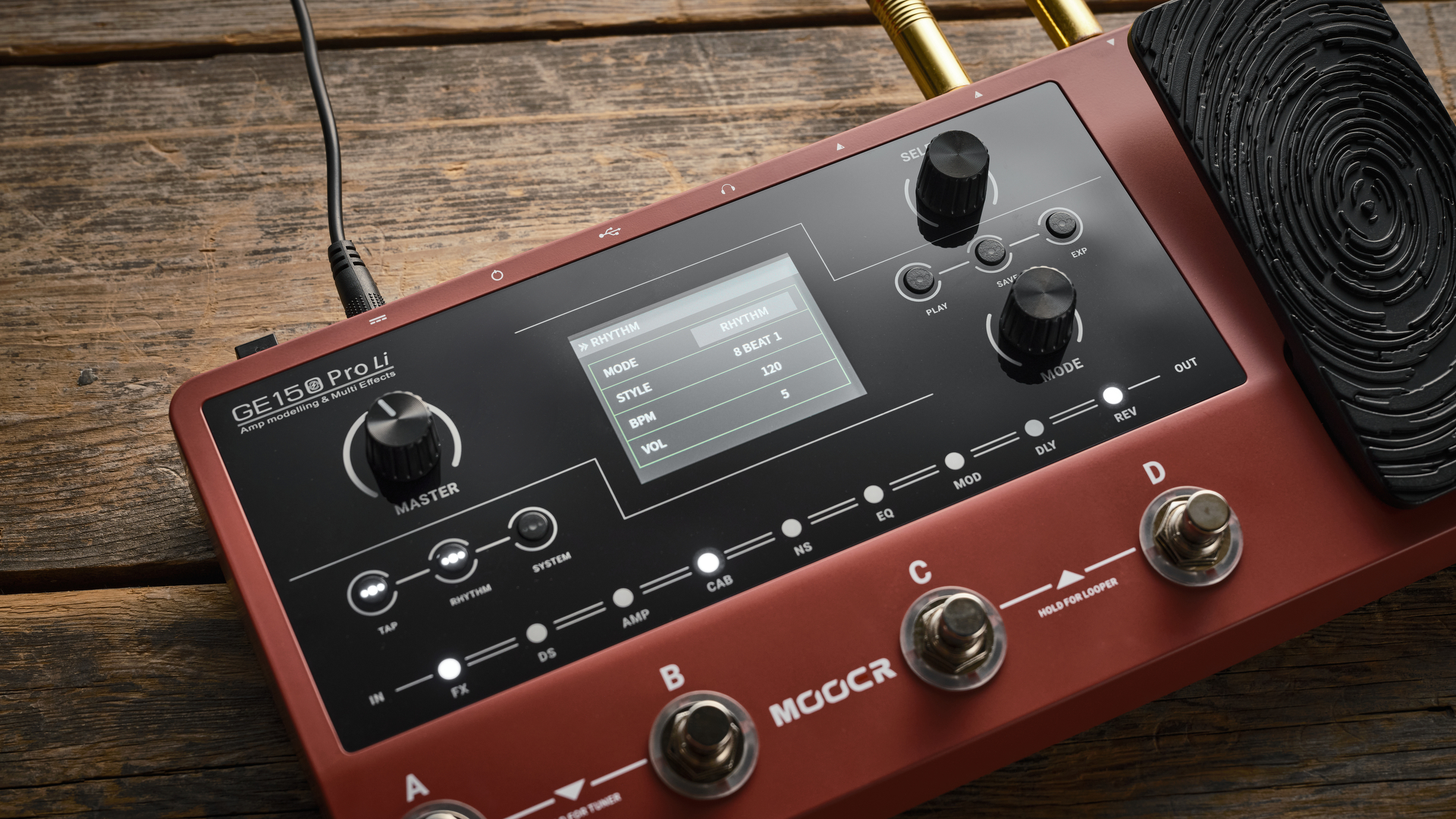 Mooer GE150 Pro li on wooden floor