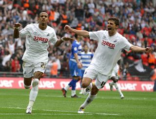 Scott Sinclair (left) scored a hat-trick in Swansea's 4-2 Championship play-off final victory against Reading