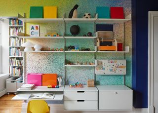 A child's bedroom with wall storage