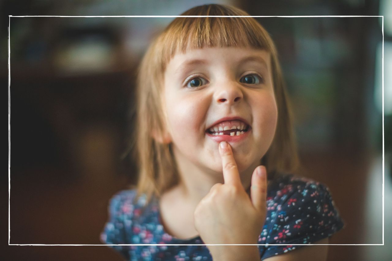 Happy child showing off tooth gap