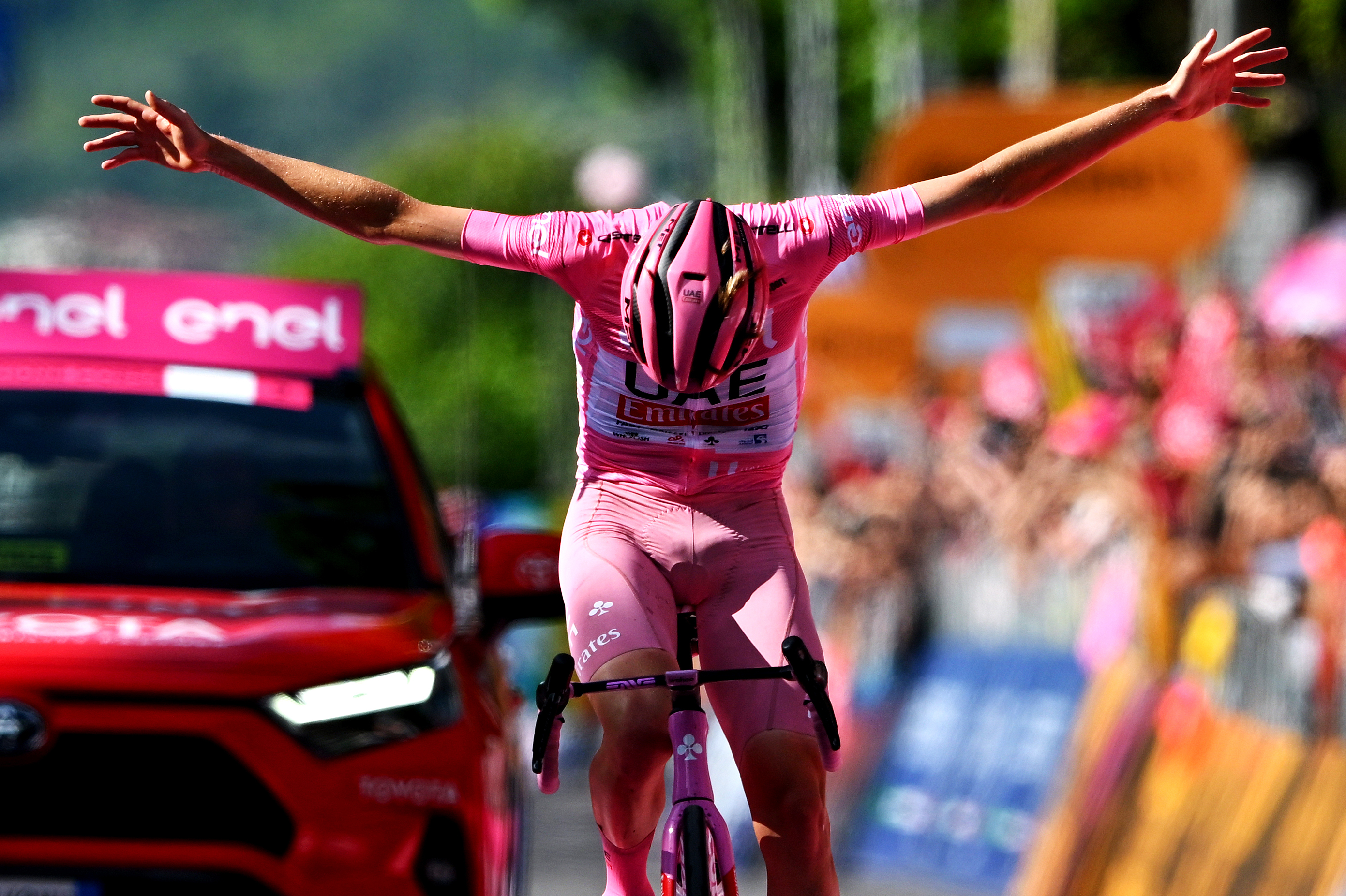 BASSANO DEL GRAPPA, ITALY - MAY 25: (EDITOR'S NOTE: Alternate crop) Tadej Pogacar of Slovenia and UAE Team Emirates - Pink Leader Jersey celebrates at finish line as stage winner during the 107th Giro d'Italia 2024, Stage 20 a 184km stage from Alpago to Bassano del Grappa / #UCIWT / on May 25, 2024 in Bassano del Grappa, Italy. (Photo by Dario Belingheri/Getty Images)