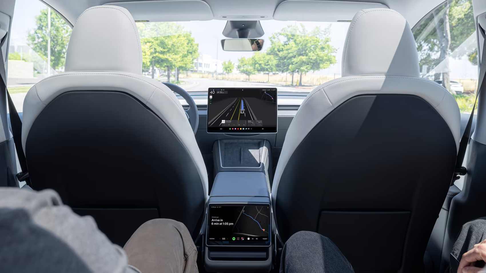 The view from the rear passenger seats of a ride in a Tesla Robotaxi