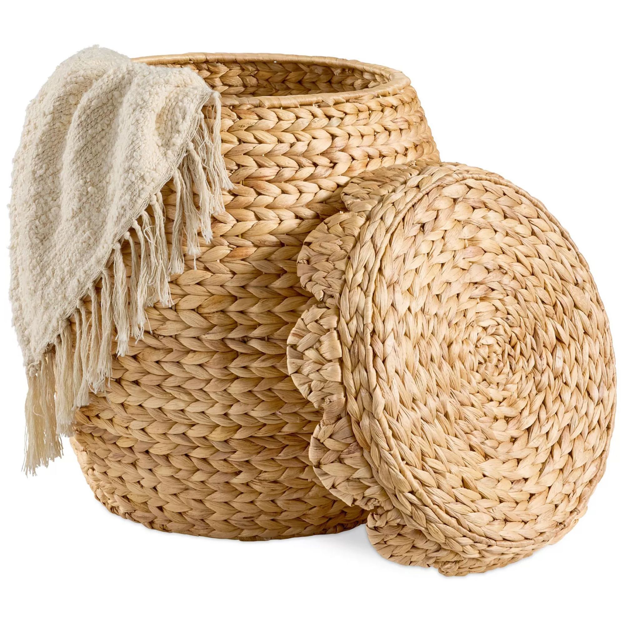 Woven basket with matching scallop lid and cream colored blanket