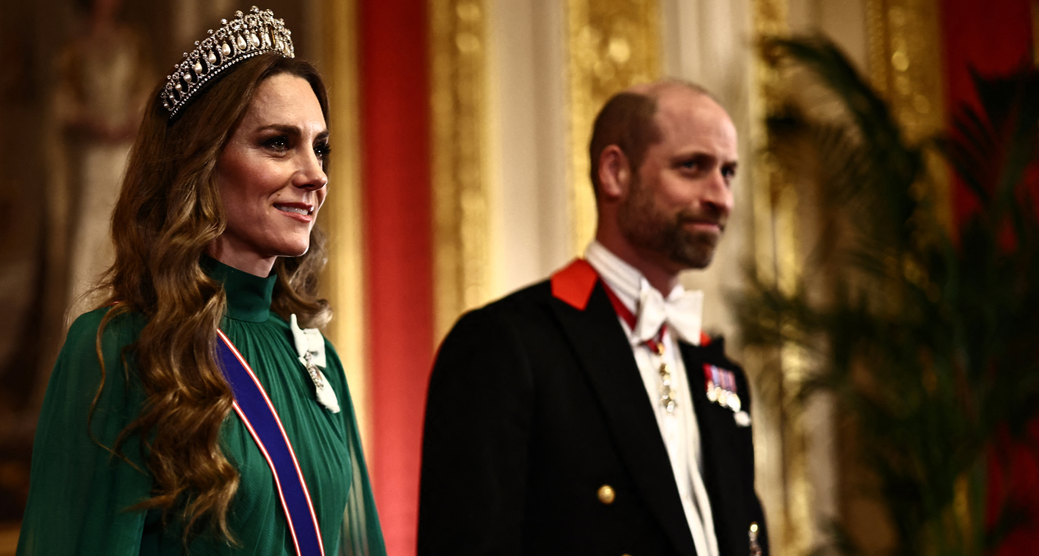 Princess Kate wearing a green gown and the Lover's Knot Tiara
