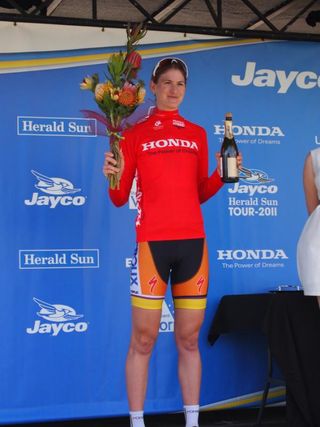 Loren Rowney stands atop the podim after her win on stage 2 of the Honda Hybrid Women's Tour.