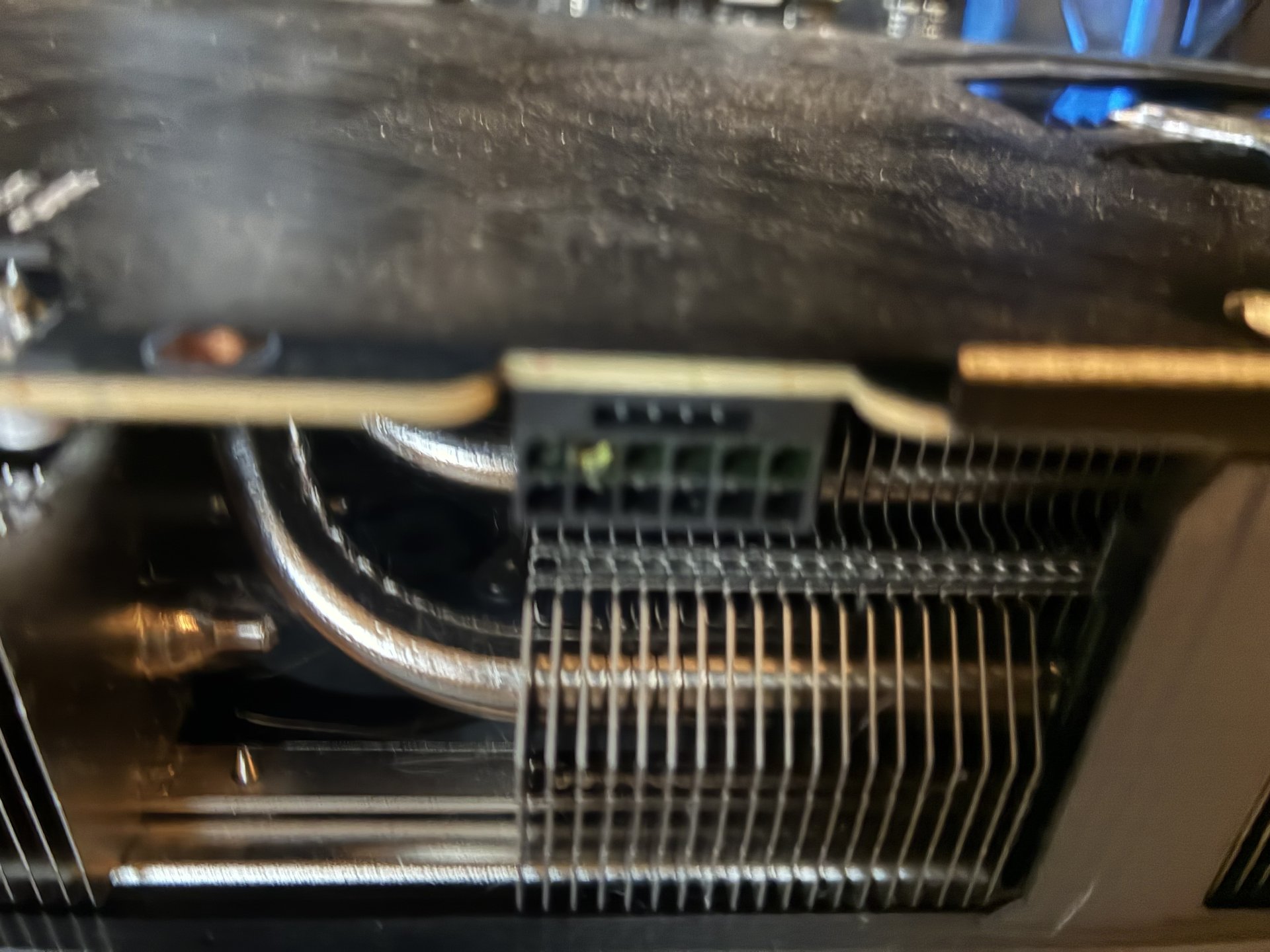 A post-DLSS 5 RTX 5090 suffering from a genetic disease known as its 16-pin connector melting